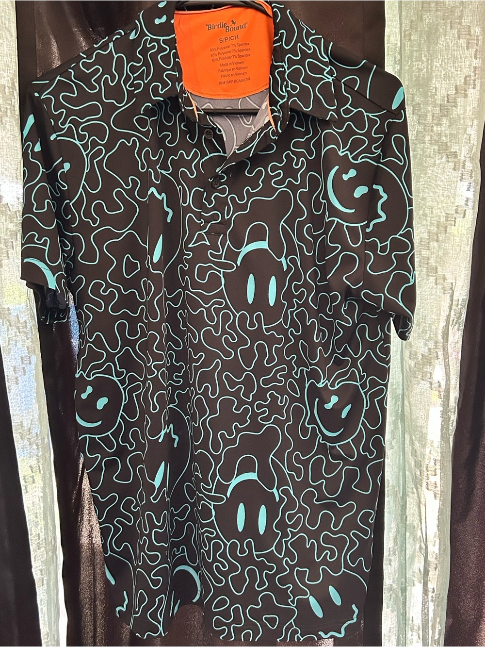 Birdie bound Black Polo with Teal Smiley Pattern